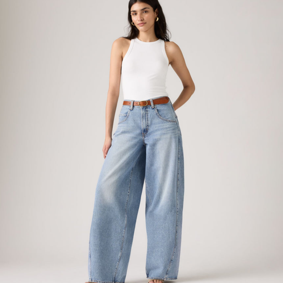 Lady wearing Levi's Baggy Jeans and white tank